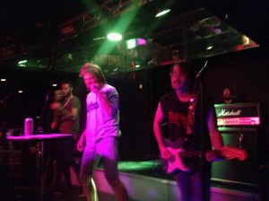 Pat, mere hours after meeting him for the first time, rocking out to live band karaoke.